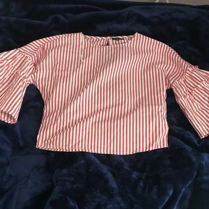 A medium sized shirt , never worn